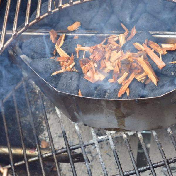 Using wood chips hotsell on a charcoal grill